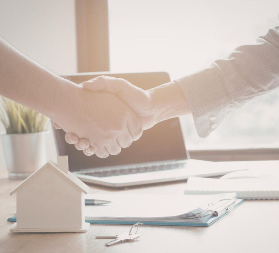 Handschlag Immobilienverkauf
